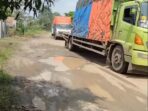 Jalan provisi Akses pintu Tol Di Tubaba Rusak Parah Bak Kolam pemandian Gajah